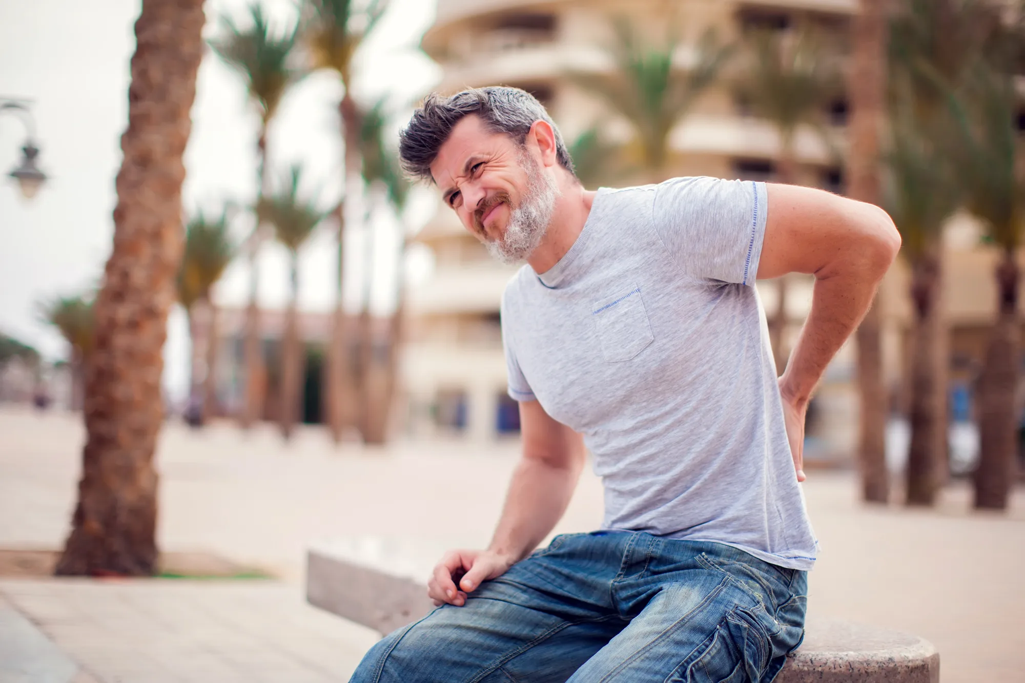 A middle-aged man in New Jersey with lower back pain.