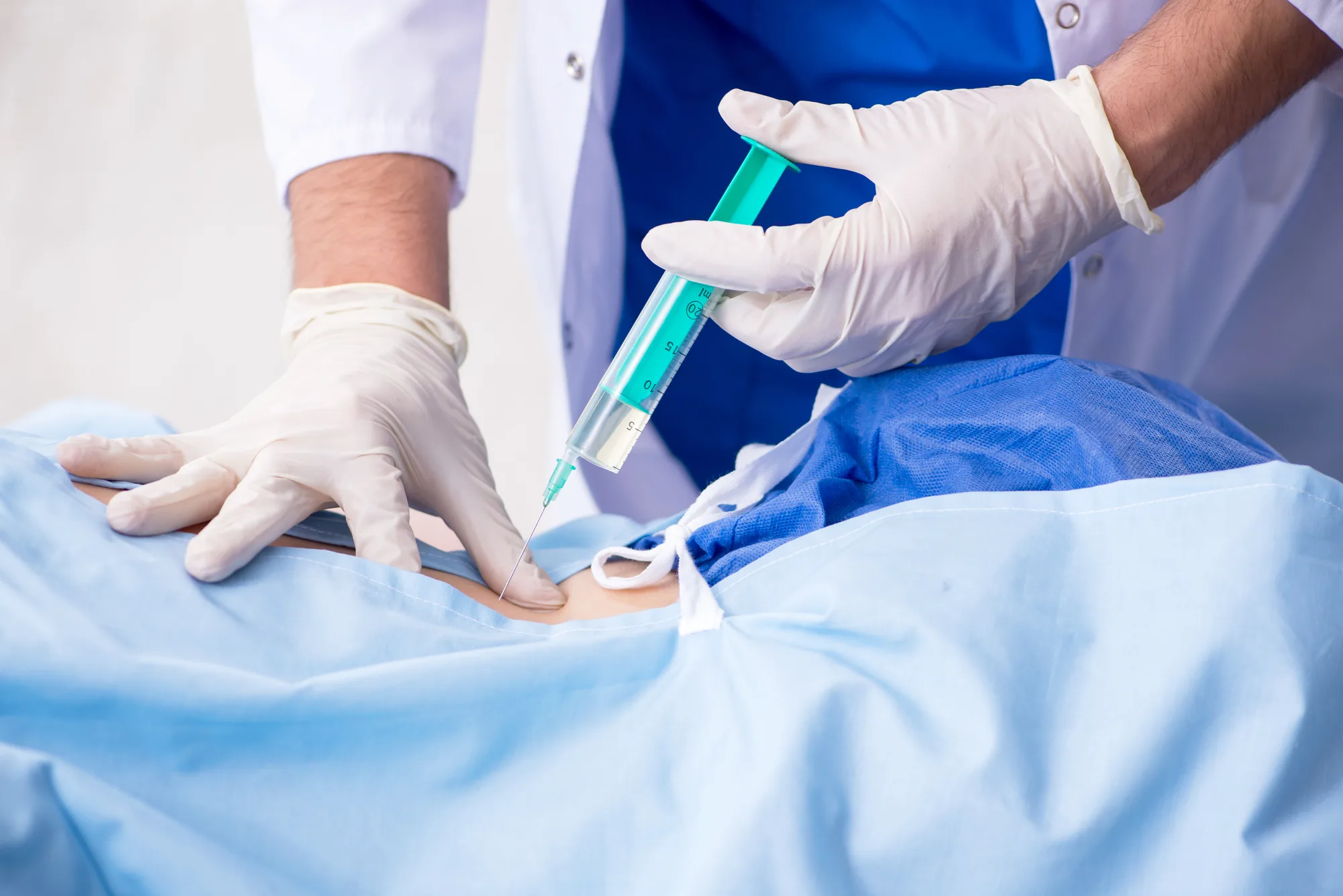 A New Jersey spinal patient being injected with epidural steroids.