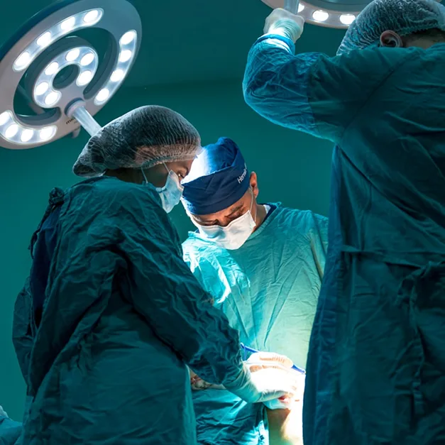 New Jersey spinal surgeons diligently operating on a patient